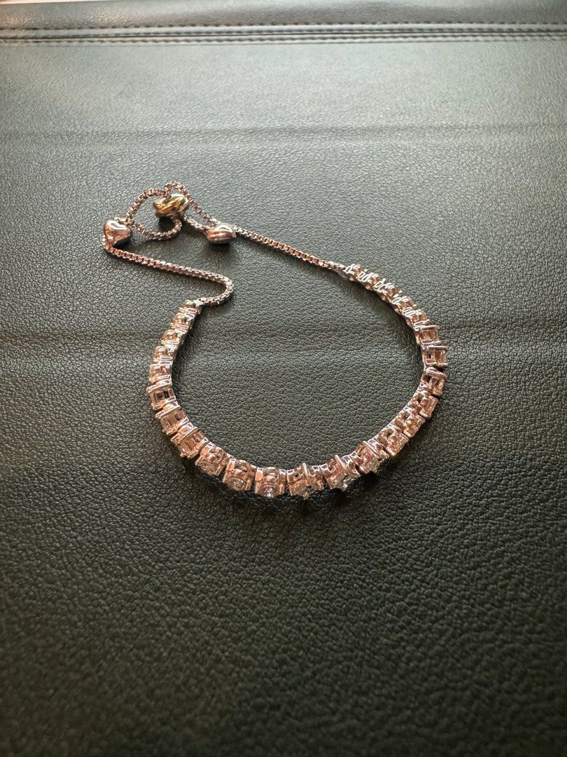 Authentic Tennis bracelet (Category: Jewelry) located in Quezon City. Submitted by everythingInternational (Listing ID 1331022793, Image 1). Description: Selling 100% Authentic tennis bracelet Actual photos posted RFS: extra jewelry Price is slightly negotiable.