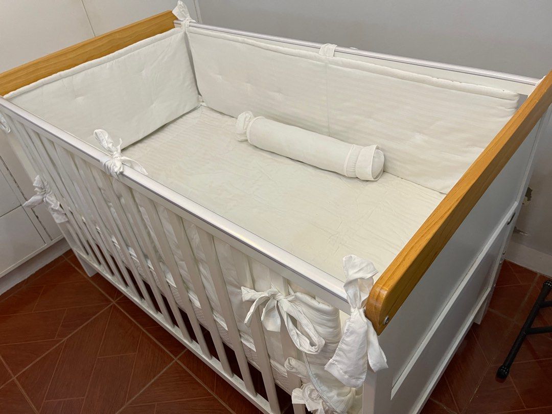 Cuddle Bug Convertible Crib with Mattress - with Freebies (Category: Cots & Cribs) located in Antipolo. Submitted by ljanedp (Listing ID 1307395829, Image 1). Description: - Cuddlebug Crib (White/honey) - Convertible to toddler bed (last photo) - Crib railings and teething guard - With Premium Uratex Mattress (washable cover) - Freebies: 1. Complete set of comforter, bedsheets, pillows and bump guard (plain white, 100% cotton, worth ₱4,000) 2. Fr