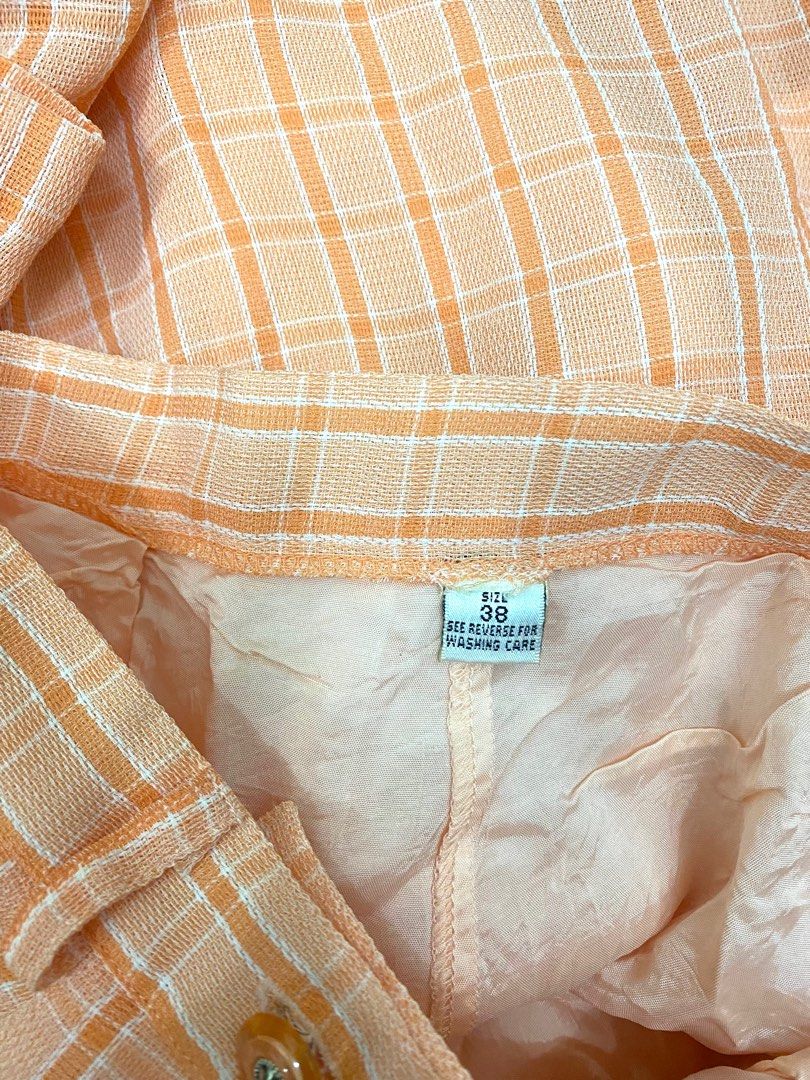orange plaid skirt (Category: Skirts) located in Quezon City. Submitted by emptygrounds (Listing ID 1330992547, Image 3). Description: ✨ 27” WAIST ✨ lined, buttons are functional.
