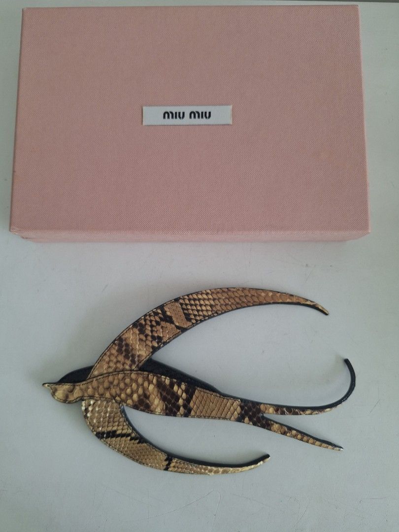 MIU MUU LEATHER BROACH