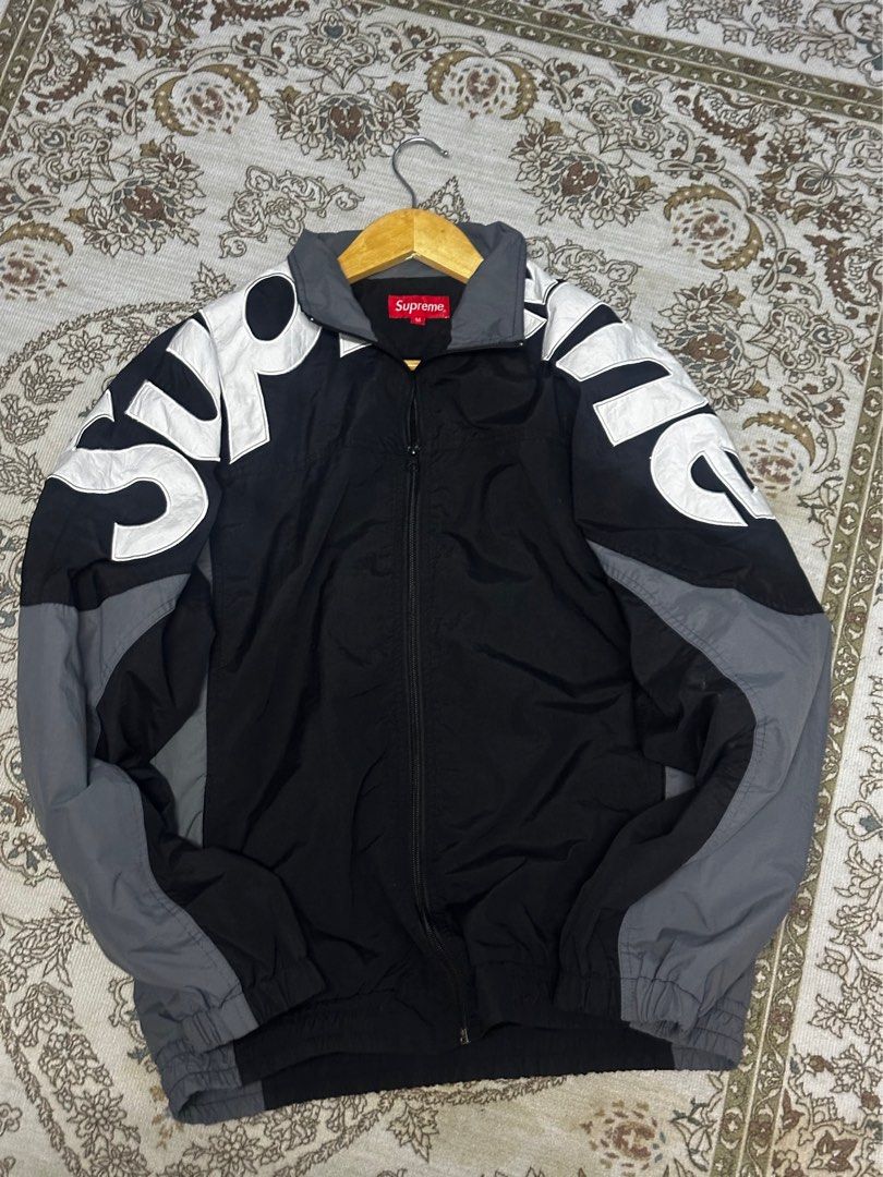 supreme wind breaker shoulder spell out