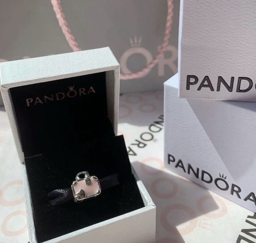 Pandora pink travel bag charm hotsell