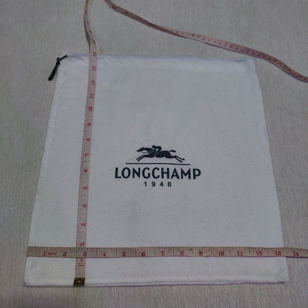 Authentic Longchamp dust bag 14x13.5 inches (Category: Luxury Bags & Wallets) located in Manila. Submitted by jfluxury.co (Listing ID 1331176208, Image 3). Description: excellent condition no flaws bought in Japan 🇯🇵 💯% Authentic. 😊 Money back guarantee. 😊 Clean and ready to use na po.