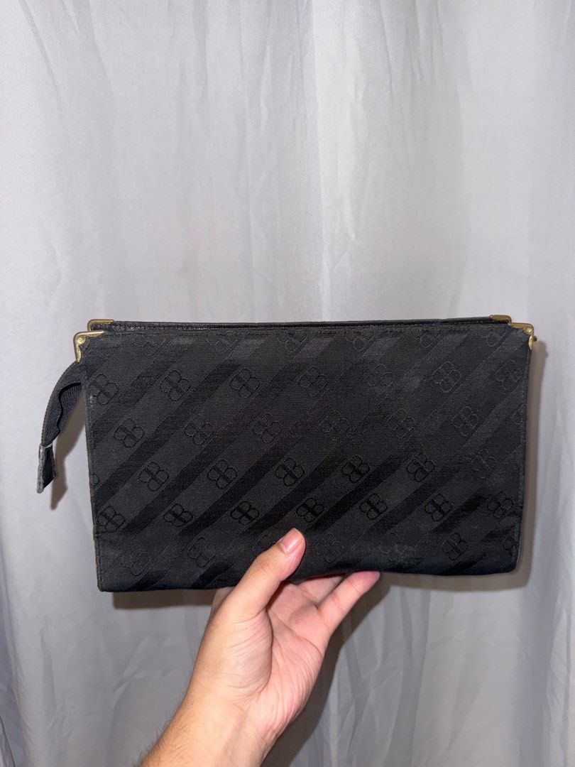 BALENCIAGA Clutch (Vintage) (Category: Clutches) located in Quezon City. Submitted by teoclosetclear (Listing ID 1331150603, Image 2). Description: Vintage Balenciaga Monogram Clutch/Cosmetic Bag in Black Canvas with Lambskin Interior and Antique Gold Hardware Still in good condition. Unnoticable signs of wear. No issues at all! RFS: Need funds asap Still negotiable so let me know if you’re interested! .