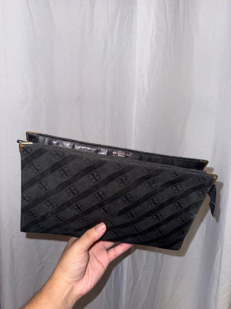 BALENCIAGA Clutch (Vintage) (Category: Clutches) located in Quezon City. Submitted by teoclosetclear (Listing ID 1331150603, Image 1). Description: Vintage Balenciaga Monogram Clutch/Cosmetic Bag in Black Canvas with Lambskin Interior and Antique Gold Hardware Still in good condition. Unnoticable signs of wear. No issues at all! RFS: Need funds asap Still negotiable so let me know if you’re interested! .