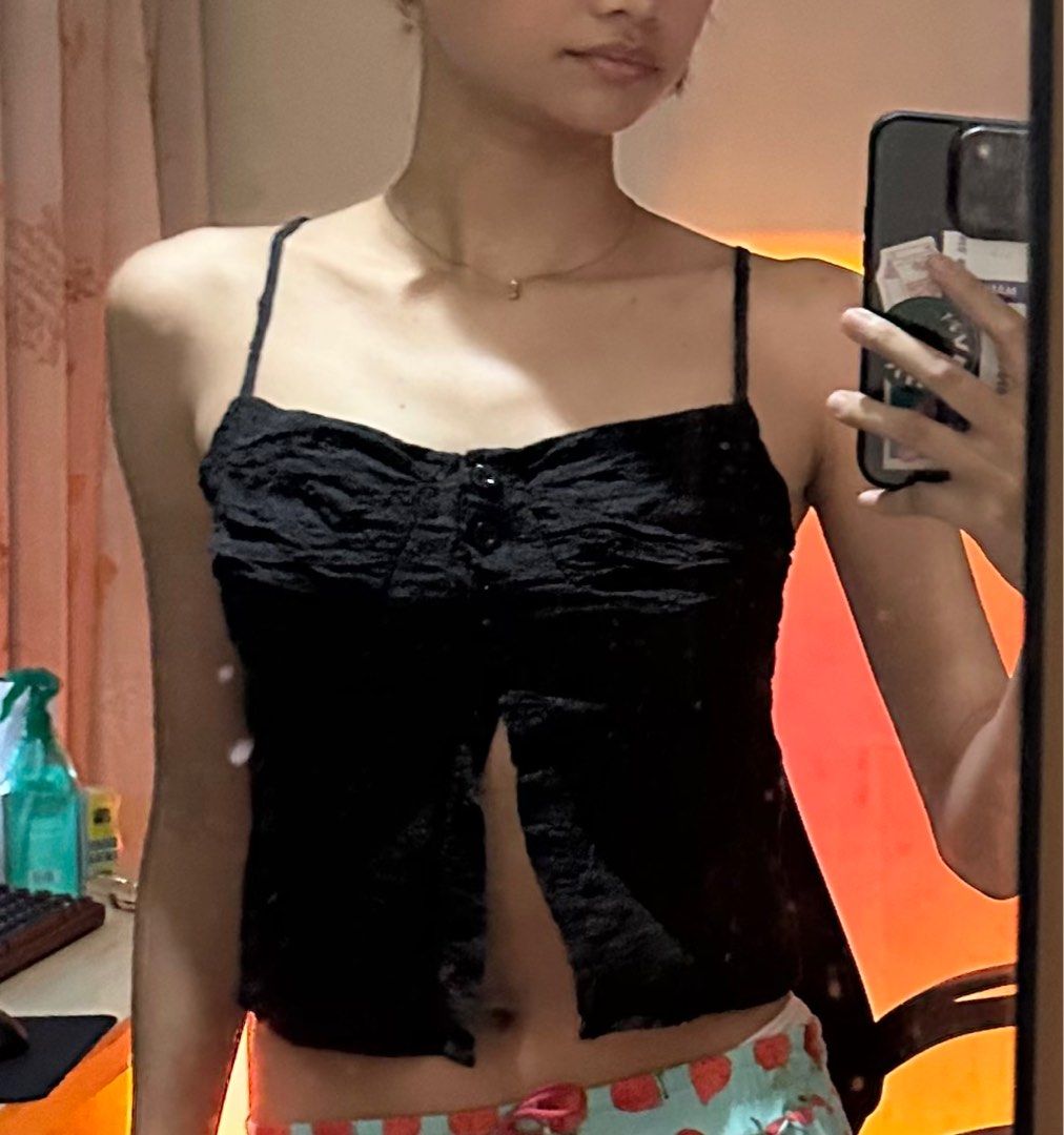 black y2k strap ruched hollow button camisole (Category: Sleeveless) located in Manila. Submitted by yanarchives (Listing ID 1331218286, Image 1). Description: brand new! never been used available as long as posted.