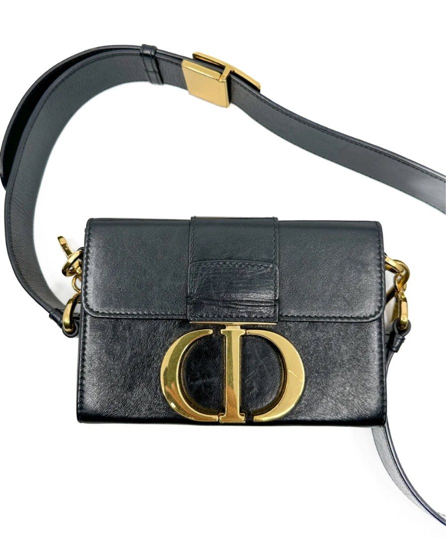 Christian Dior Black Calfskin Leather 30 Montaigne Box Bag (Category: Women's Bags & Wallets) located in Sydney. Submitted by james.mitra (Listing ID 1331174250, Image 1). Description: Crafted from exquisite calfskin leather, this iconic bag epitomizes sophistication and timeless elegance. With its sleek silhouette and minimalist design, it’s a versatile accessory that effortlessly elevates any outfit. Despite its compact size, it offers ample st