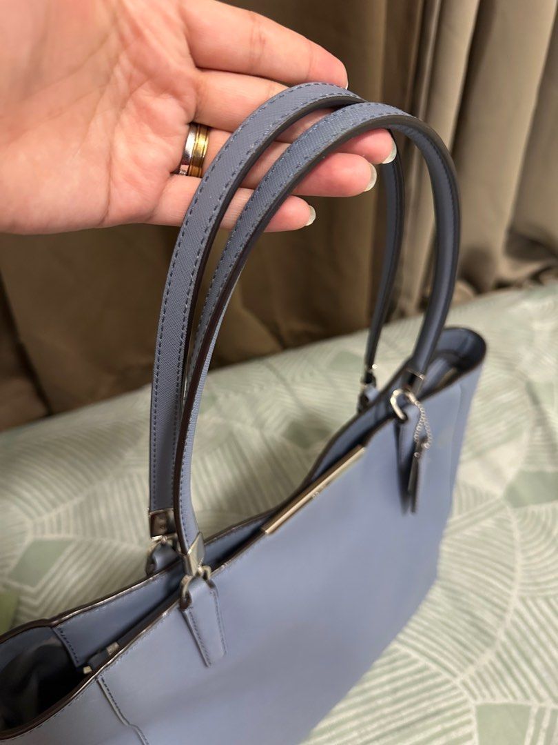 Coach Tote bag (Category: Luxury Bags & Wallets) located in Malabon City. Submitted by zyrabojos (Listing ID 1331223476, Image 3). Description: Coach Tote bag in Saffiano leather Still in good condition with just light stain All hardwares are in excellent condition.