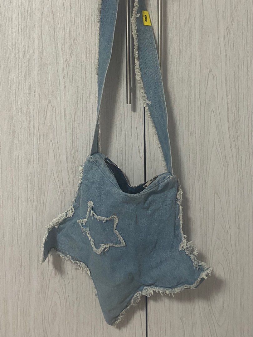 Denim Y2K Bag with Zipper and inner Lining (Category: Cross-body Bags) located in Iloilo. Submitted by gloomanomaly (Listing ID 1331096094, Image 1). Description: Price: 350 + sf Brand: Echo on Tag Details: - Denim - Tie Crossbody Band - Black Inner Lining with Inner Zip - Zippers All working properly Flaw: N/A.