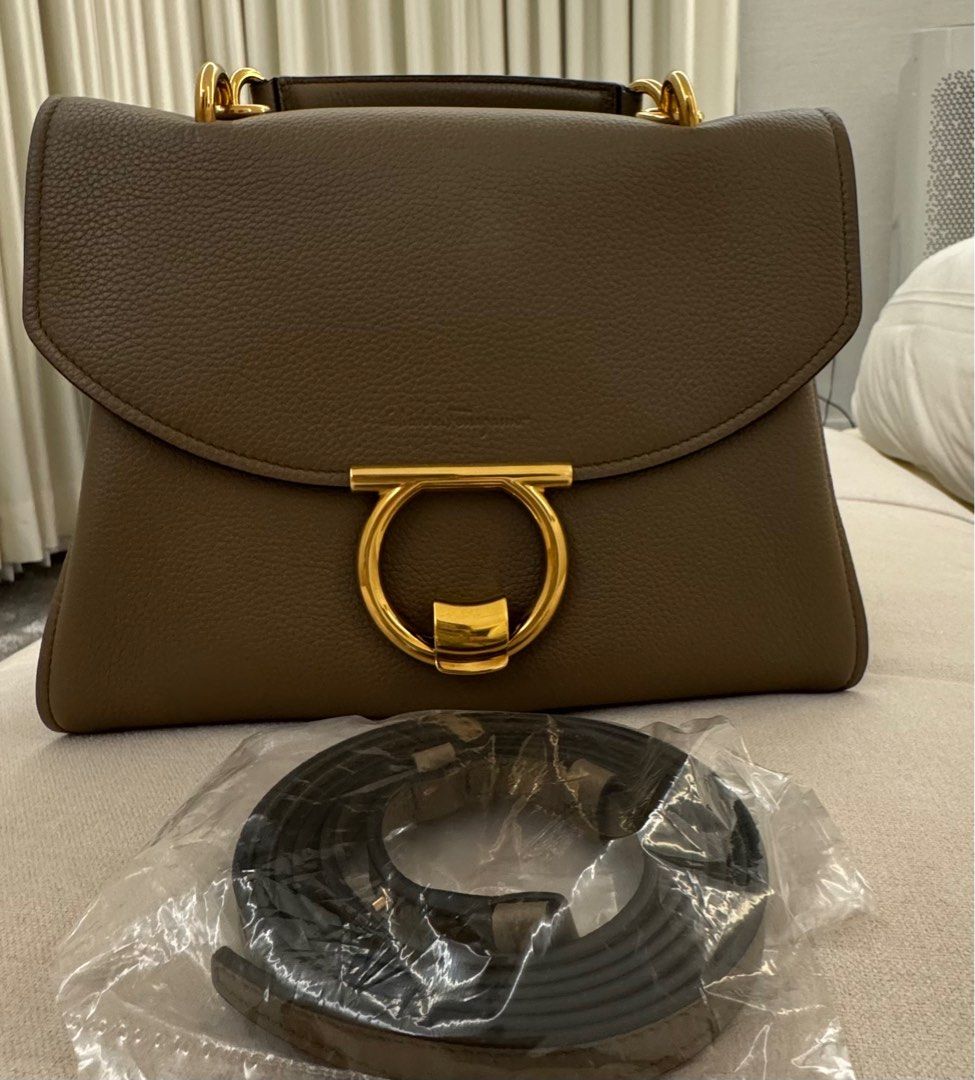 Ferregamo Gancini Top handle (Category: Luxury Bags & Wallets) located in Manila. Submitted by everyone2024 (Listing ID 1331180738, Image 1). Description: Preloved 100% authentic Inclusion : dust bag only.