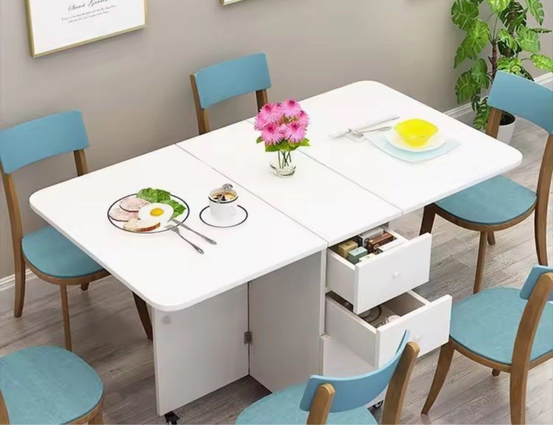 Foldable Table (Category: Tables & Sets) located in Singapore. Submitted by ajitarote (Listing ID 1331187319, Image 1). Description: Simple Folding Table Dining Table Small Apartment Home 4 Multi-Functional Retractable Dining Table with Drawer Rectangular Sideboard Cabinet.