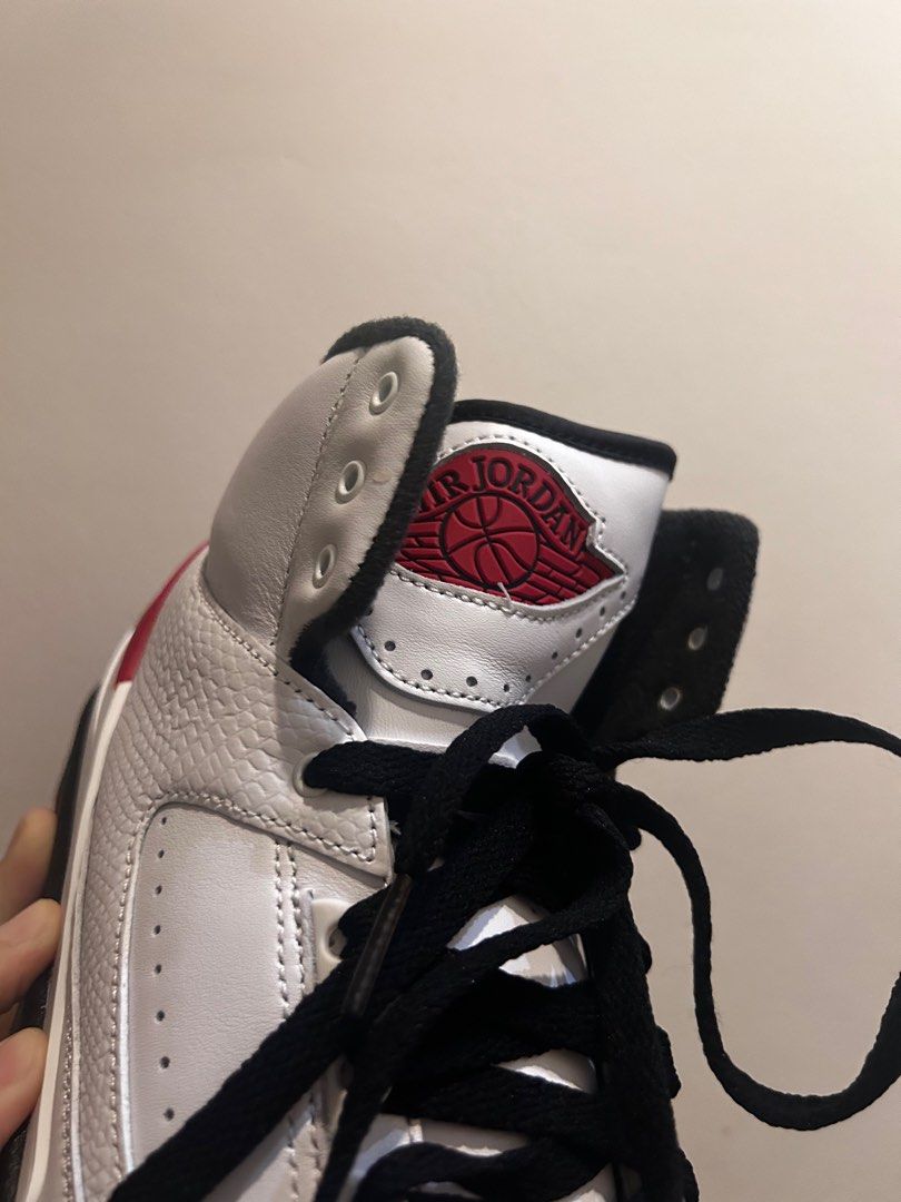 Jordan 2 white/varsity red (Category: Sneakers) located in Makati City. Submitted by anotherpinpoint (Listing ID 1331172949, Image 3). Description: Great condition. Tag still on shoe. 100% original .