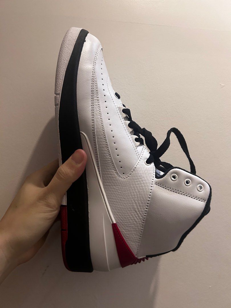 Jordan 2 white/varsity red (Category: Sneakers) located in Makati City. Submitted by anotherpinpoint (Listing ID 1331172949, Image 2). Description: Great condition. Tag still on shoe. 100% original .