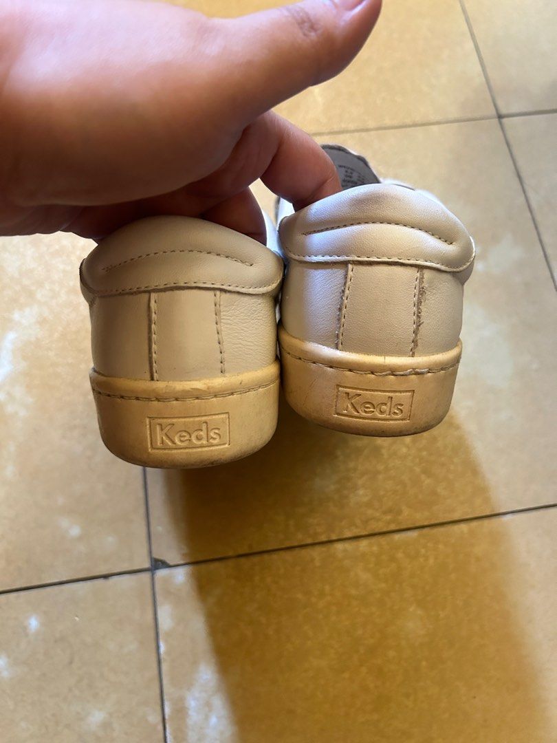 Keds Slip On White Sneakers (Category: Sneakers) located in Pasig City. Submitted by charm.charm2 (Listing ID 1331168763, Image 3). Description: Original Keds Slip On Sneakers Good as New US 6.5 RFS: Too many shoes No to joyjoy pls...