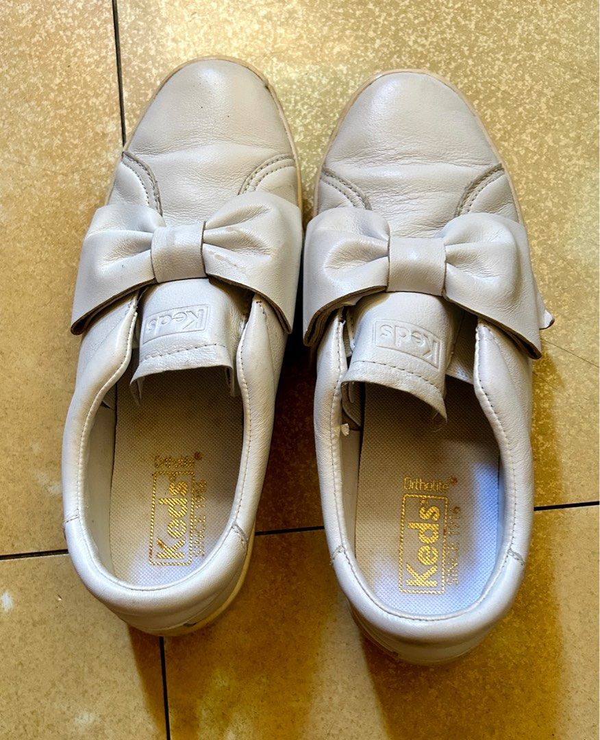 Keds Slip On White Sneakers (Category: Sneakers) located in Pasig City. Submitted by charm.charm2 (Listing ID 1331168763, Image 1). Description: Original Keds Slip On Sneakers Good as New US 6.5 RFS: Too many shoes No to joyjoy pls...