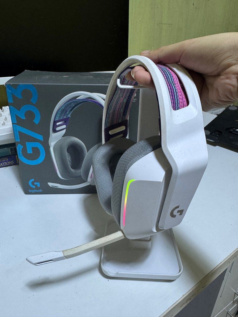 Logitech g733 Wireless gaming headset (Category: Headphones & Headsets) located in Paranaque City. Submitted by shamijapanpreloves (Listing ID 1331112705, Image 2). Description: Logitech G733 - Wireless (comes with a 2.4Hz USB dongle) - With microphone (detachable) comes with the free headphone stand (as seen on the picture) No defects on functionality. Newly replaced ear pads Shipping will be handled by the buyer..