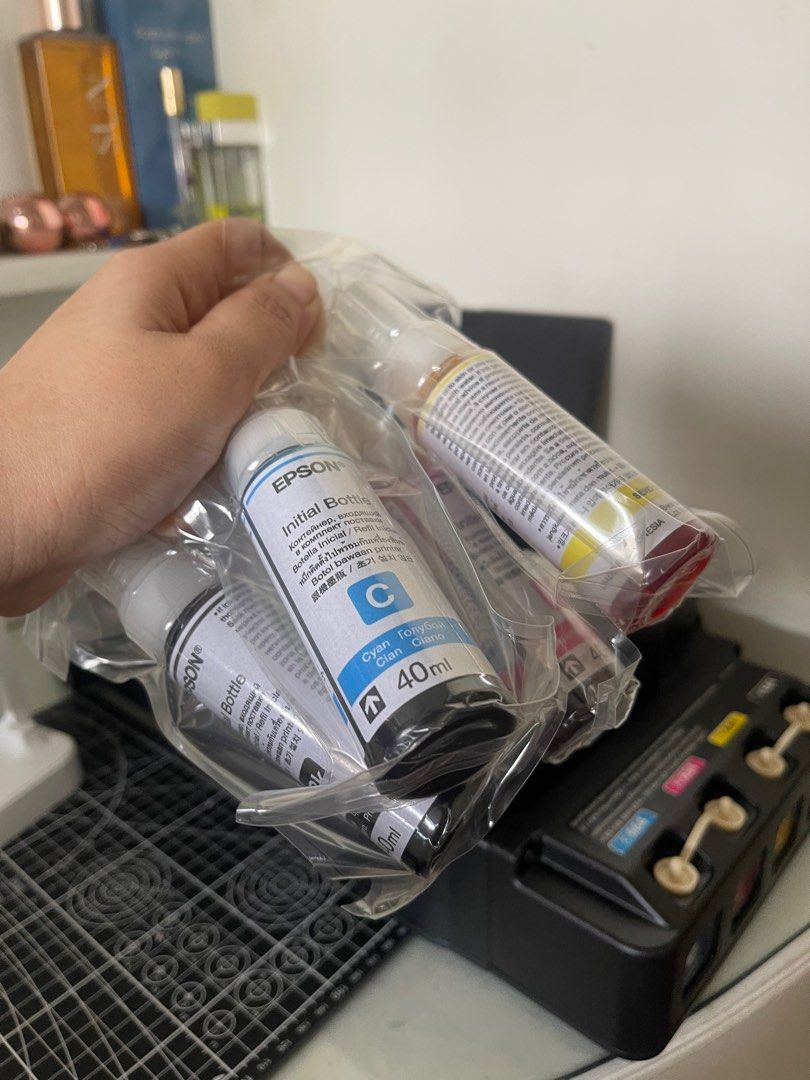 Orig Epson Initial Bottle (Category: Printers, Scanners & Copiers) located in Quezon City. Submitted by waddieclutters (Listing ID 1331059191, Image 2). Description: Rfs: bought a new epson l121 and used pigment ink Retiro QC .