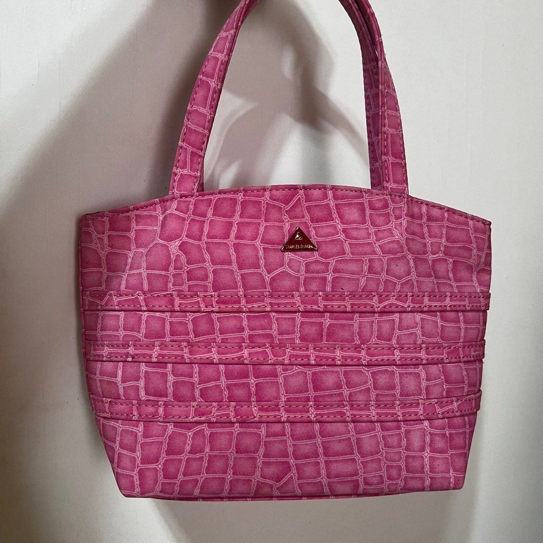 Pink Small Bag (Category: Purses & Pouches) located in Caloocan City. Submitted by _miumuse (Listing ID 1331088037, Image 1). Description: • Fabric not leather • Barbie core • Dimension: L10xHT6.5in.