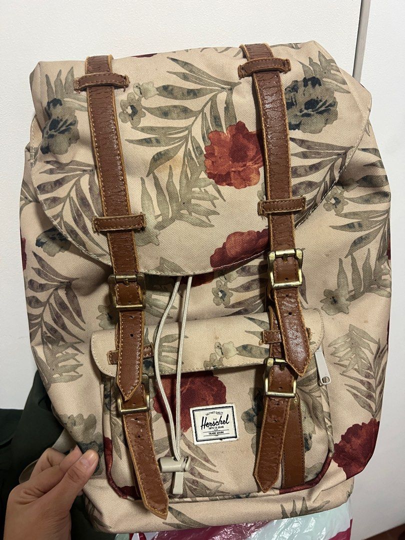 PRELOVED HERSCHEL MID AMERICA BACKPACK FLORAL (Category: Backpacks) located in Manila. Submitted by dballison (Listing ID 1331217539, Image 2). Description: Everything is functional except for the leather parts (nagbakbak na) Kinda rusty na din sa metal parts. But everything is still functional - zipper magnets Just used for 3months pre pandemic and nastuck na. .