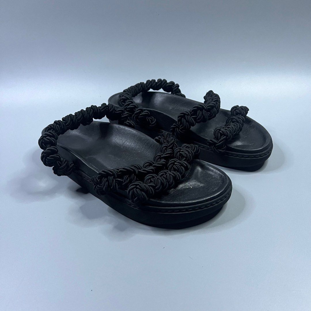 Simone Rocha - Macramé Leather Slides (Category: Sandals) located in Paranaque City. Submitted by millennial_goodz (Listing ID 1331177098, Image 1). Description: WTS Simone Rocha Macramé Leather Slides Size 39 Authentic Excellent condition - No flaws P2,499 only DM.