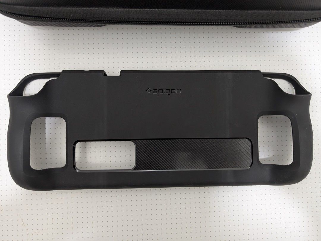 Spigen Rugged Armor Pro Case + Carrying Bag for Steam Deck (Category: Cases & Covers) located in Cavite. Submitted by averysortijas (Listing ID 1331120596, Image 3). Description: Used Minor fraying on the inside mesh due to the velcro strap.