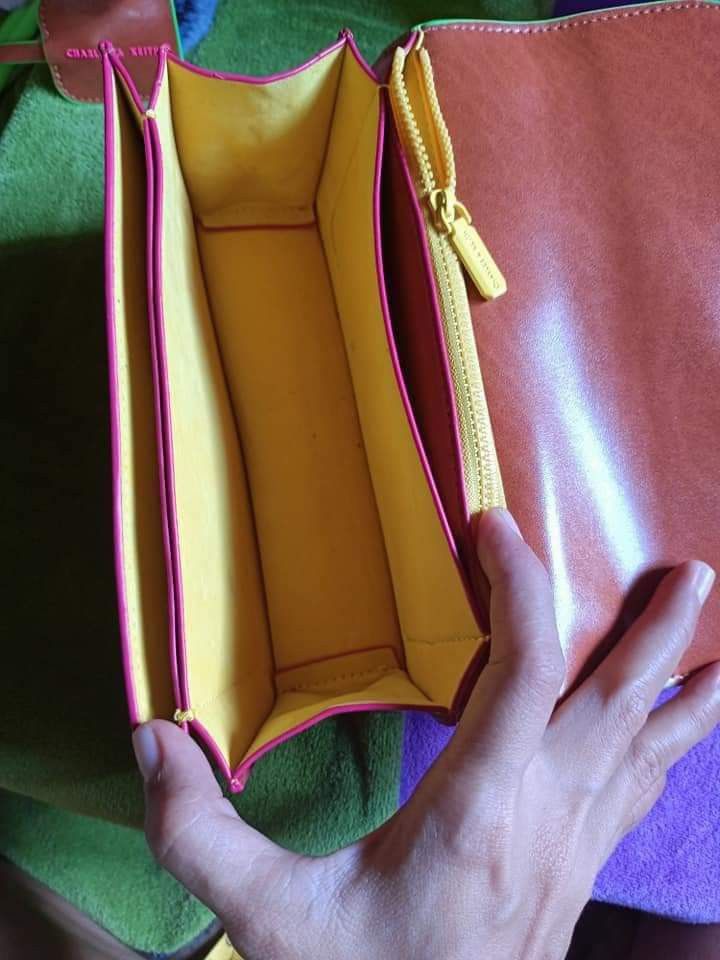 Tan Clove Cross Body Bag (Category: Cross-body Bags) located in Manapla. Submitted by baggeliaph_25 (Listing ID 1331104504, Image 2). Description: Re-Stock Charles & Keith Brandnew With Tag/DustBag Payment First by G-Cash Shipping Only via J&T.