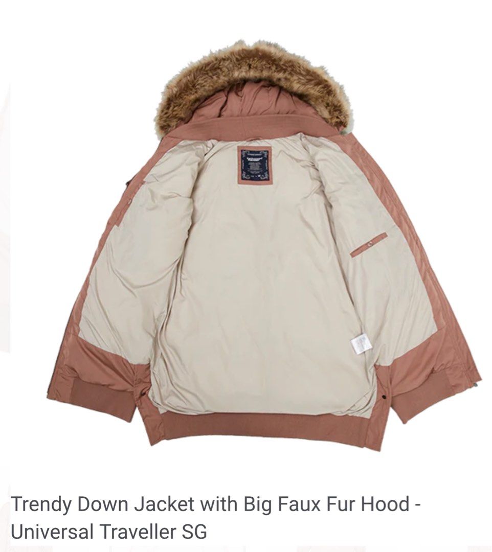WINTER JACKET (Category: Coats, Jackets and Outerwear) located in Singapore. Submitted by srss88 (Listing ID 1331165227, Image 2). Description: Univeral Traveller Trendy Down Jacket with Big Faux Fur Hood ONLY WORN ONE TIME DEC 2024 Original Price $256 Features: Bomber inspired Irregular length with sides opening Oversized ribbon fastening pockets 3 internal security pockets Fabric Content: S : 100% Polyester L : 100% Polyester, F: 90% Down 10% F