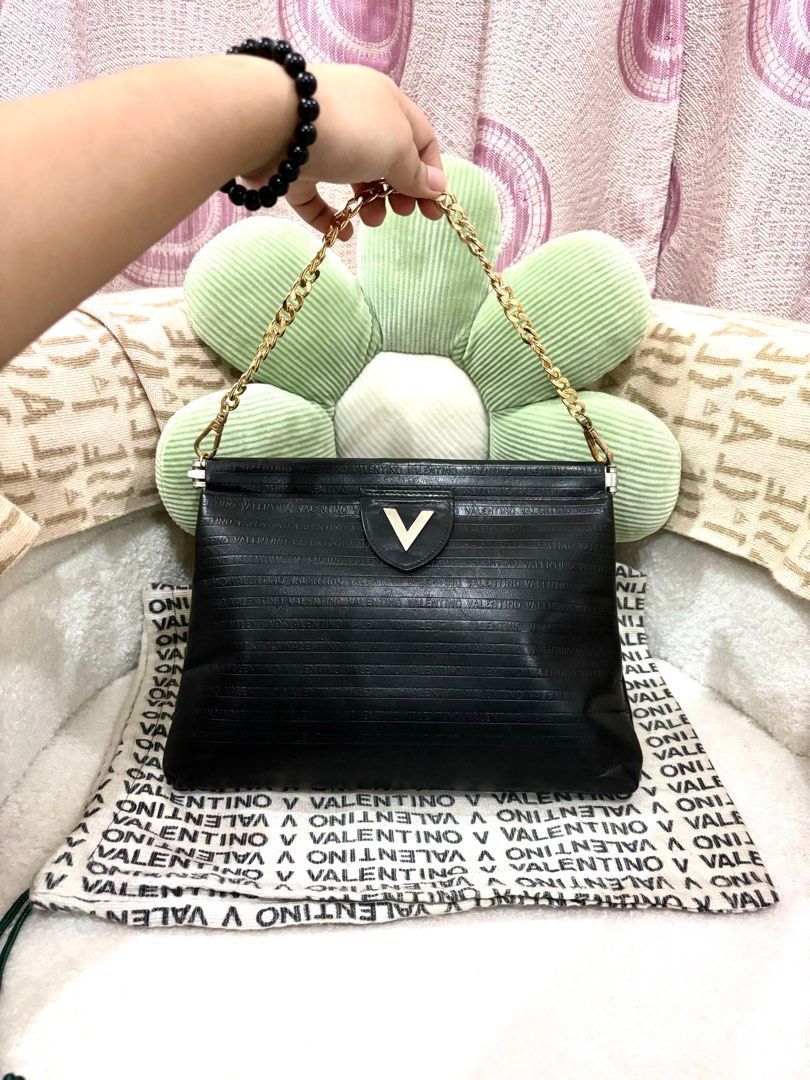 Valentino clutch price 2025
