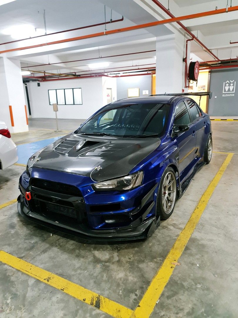Mitsubishi Lancer Evolution X 2.0 GSR (M) (Category: Used Cars) located in Singapore. Submitted by venividivici71 (Listing ID 1331281405, Image 3). Description: *Test water* Fully loaded Evo x GSR for sale. All performance and parts I bought are genuine and brand new. What you see is what you get with photos attached gentle remind this is actually my effort instead of money. Seldom drive, sheltered carpark. Feel free to PM me, discuss more about 