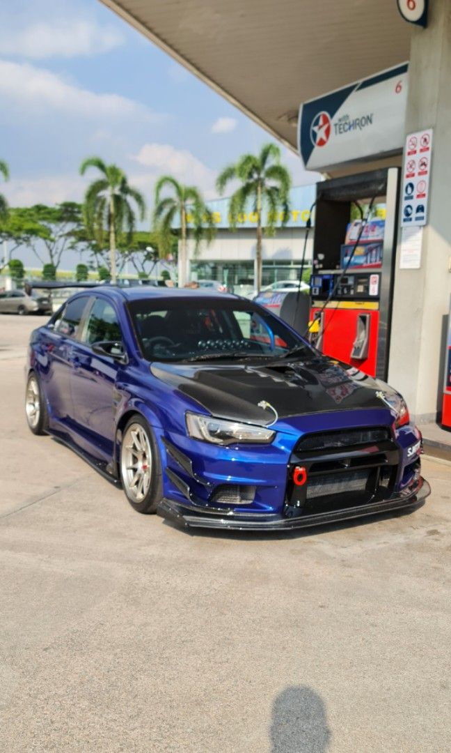 Mitsubishi Lancer Evolution X 2.0 GSR (M) (Category: Used Cars) located in Singapore. Submitted by venividivici71 (Listing ID 1331281405, Image 2). Description: *Test water* Fully loaded Evo x GSR for sale. All performance and parts I bought are genuine and brand new. What you see is what you get with photos attached gentle remind this is actually my effort instead of money. Seldom drive, sheltered carpark. Feel free to PM me, discuss more about 