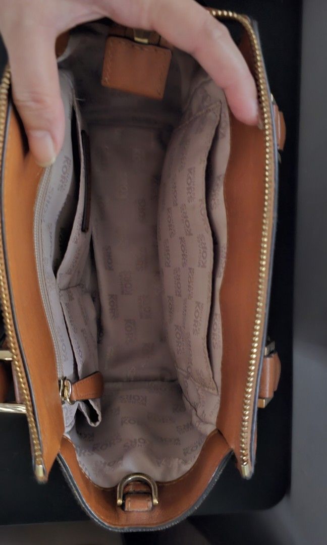 Mk sling bag (Category: Cross-body Bags) located in Valenzuela. Submitted by simplespring (Listing ID 1331310696, Image 2). Description: Color brown With strap, provided dustbag Just kept in the closet see photo for the condition Pm for more Details and inquiries Thank you.