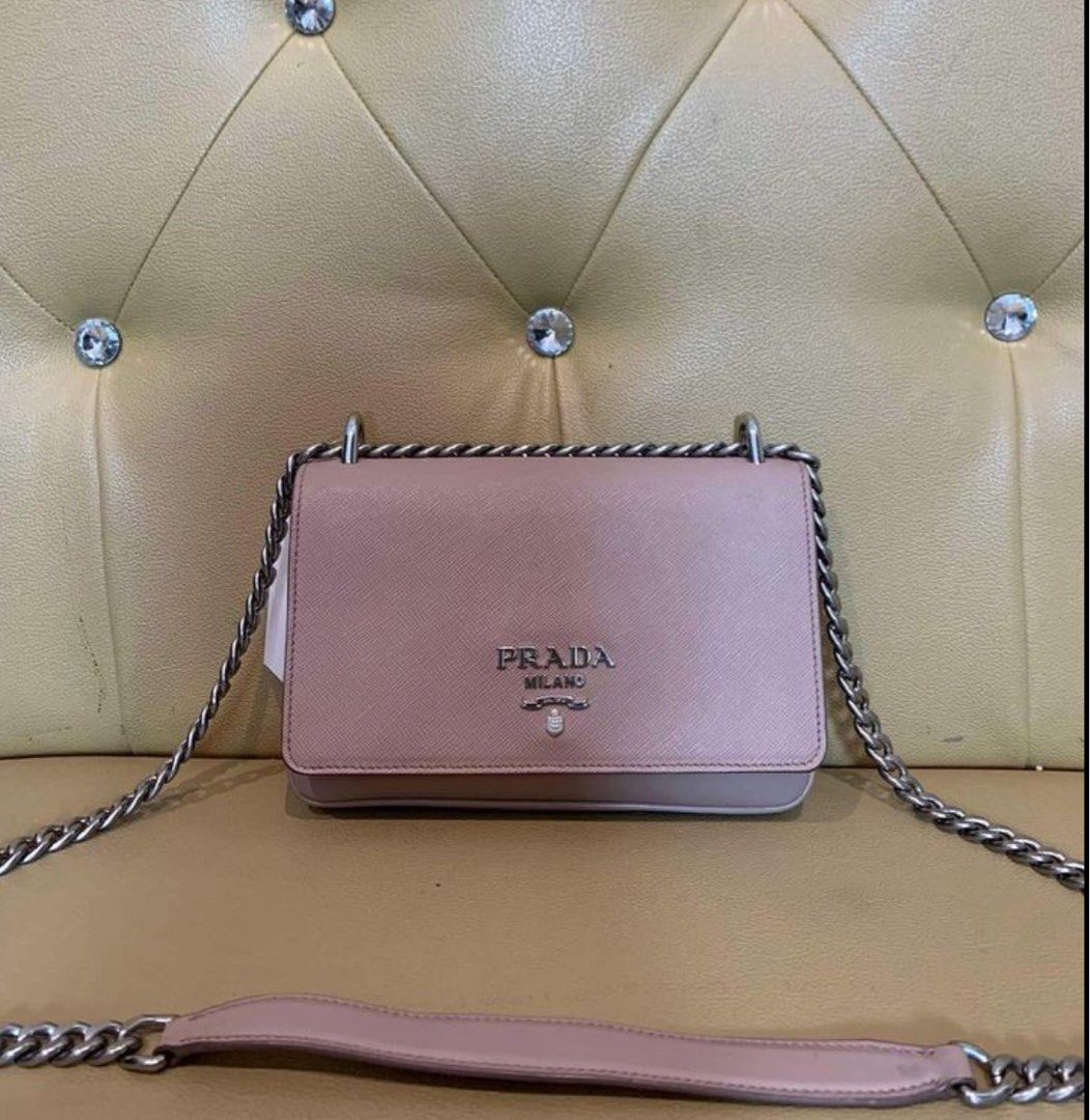Prada saffiano sling chain (Category: Luxury Bags & Wallets) located in Santa Ana. Submitted by astonandariana (Listing ID 1331296535, Image 1). Description: .