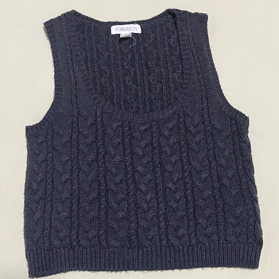 Black Forever 21 Cardigan Vest (Category: Sleeveless) located in Bustos. Submitted by kyeehy (Listing ID 1331540842, Image 1). Description: Black Cardigan Vest from Forever 21, can be paired or worn with long sleeve tops or shirt. Can be also worn alone;) Rules: No return or refund allowed. Payment will be given first before shipping out..