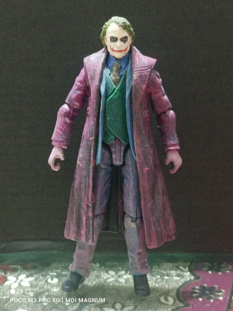 Custom 3.75" Heath Ledger's Joker (Category: Figurines & Statues) located in Muntinlupa City. Submitted by moimagnum (Listing ID 1331528135, Image 1). Description: Recipe: Headsculpt: END Creations Body: MU Professor X Long coat: SW General Hux Paints: TAMIYA and local acrylic paints and TAMIYA matte (coating) **Used only for display **Neck not movable, but tight in body **Tight joints **Free shipping **Prefer ASAP buyer **Needs funds for other h