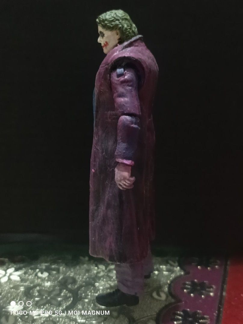 Custom 3.75" Heath Ledger's Joker (Category: Figurines & Statues) located in Muntinlupa City. Submitted by moimagnum (Listing ID 1331528135, Image 2). Description: Recipe: Headsculpt: END Creations Body: MU Professor X Long coat: SW General Hux Paints: TAMIYA and local acrylic paints and TAMIYA matte (coating) **Used only for display **Neck not movable, but tight in body **Tight joints **Free shipping **Prefer ASAP buyer **Needs funds for other h
