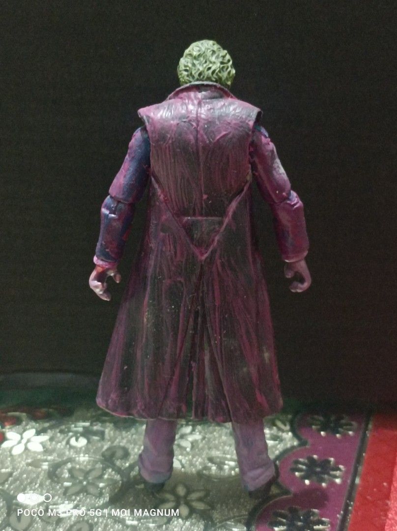 Custom 3.75" Heath Ledger's Joker (Category: Figurines & Statues) located in Muntinlupa City. Submitted by moimagnum (Listing ID 1331528135, Image 3). Description: Recipe: Headsculpt: END Creations Body: MU Professor X Long coat: SW General Hux Paints: TAMIYA and local acrylic paints and TAMIYA matte (coating) **Used only for display **Neck not movable, but tight in body **Tight joints **Free shipping **Prefer ASAP buyer **Needs funds for other h