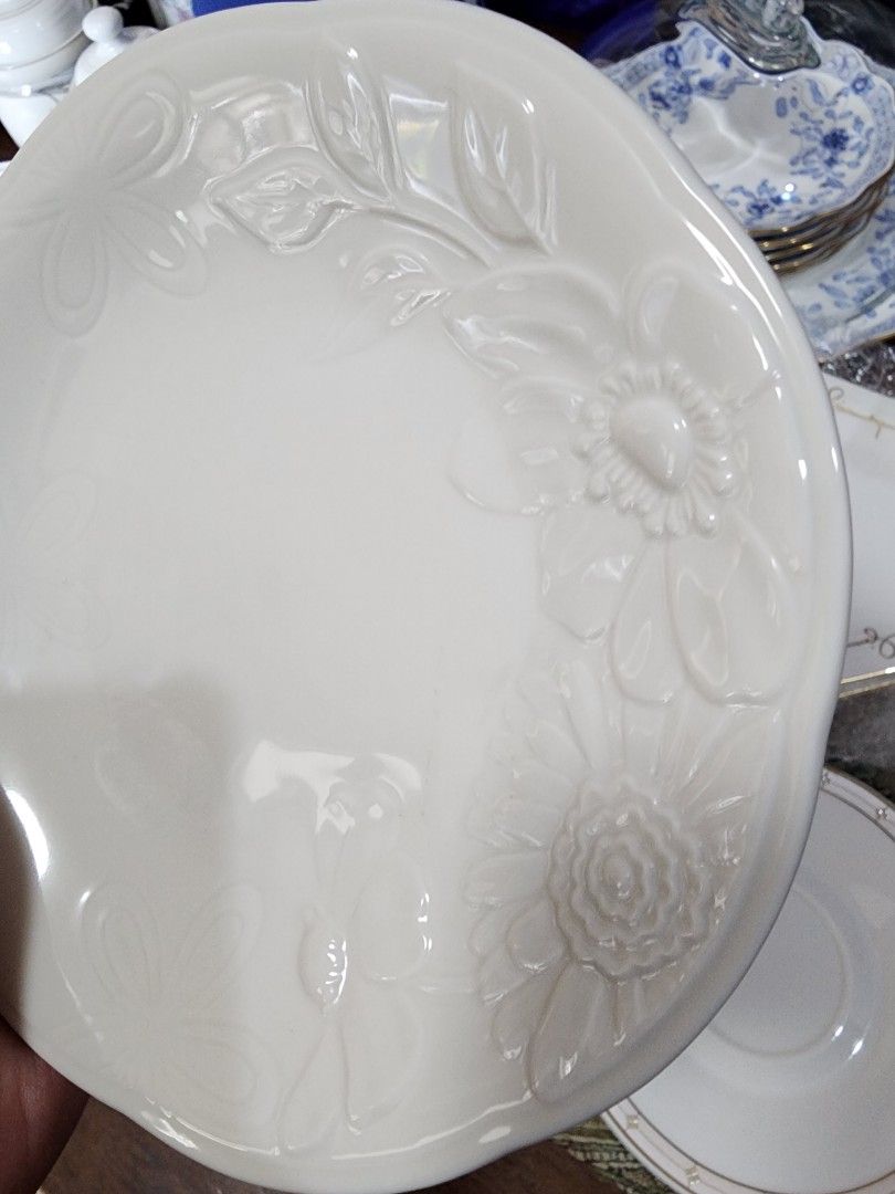 GIVENCHY White Cake Plate (Category: Dinnerware & Cutlery) located in Quezon City. Submitted by senyoramaria (Listing ID 1331447171, Image 2). Description: GIVENCHY Cake plate Embossed floral design 6.8 inches in diameter.