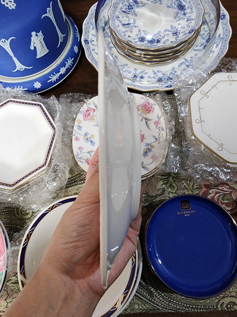 GIVENCHY White Cake Plate (Category: Dinnerware & Cutlery) located in Quezon City. Submitted by senyoramaria (Listing ID 1331447171, Image 3). Description: GIVENCHY Cake plate Embossed floral design 6.8 inches in diameter.