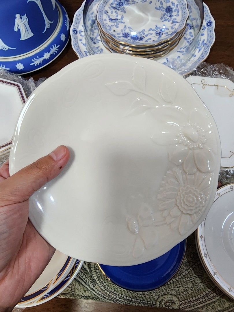 GIVENCHY White Cake Plate (Category: Dinnerware & Cutlery) located in Quezon City. Submitted by senyoramaria (Listing ID 1331447171, Image 1). Description: GIVENCHY Cake plate Embossed floral design 6.8 inches in diameter.
