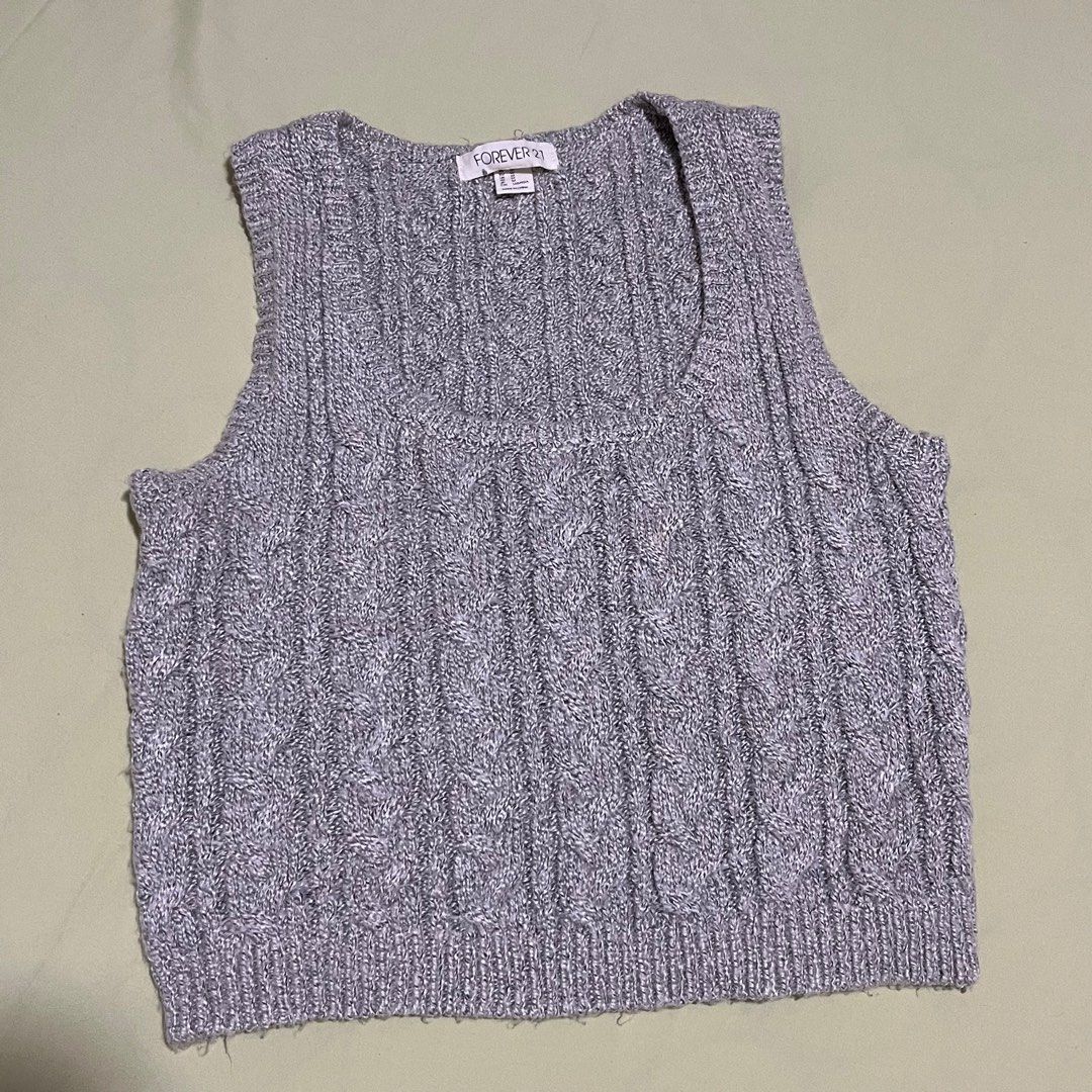 Grey Forever 21 Cardigan Vest (Category: Sleeveless) located in Bustos. Submitted by kyeehy (Listing ID 1331542694, Image 1). Description: Can be paired with long sleeves or shirt. RFS: Doesnt wear it anymore Rules: No return or refund. Items will be shipped or delivered once payment is made..