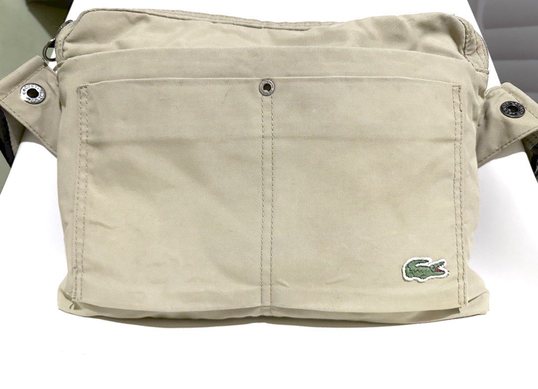 Lacoste Cream Body Bag (Category: Sling Bags) located in Manila. Submitted by classictrends_24 (Listing ID 1331425017, Image 1). Description: Lacoste Bodybag Color: Cream ***With minimal signs of usage/ please manage your expectations. .