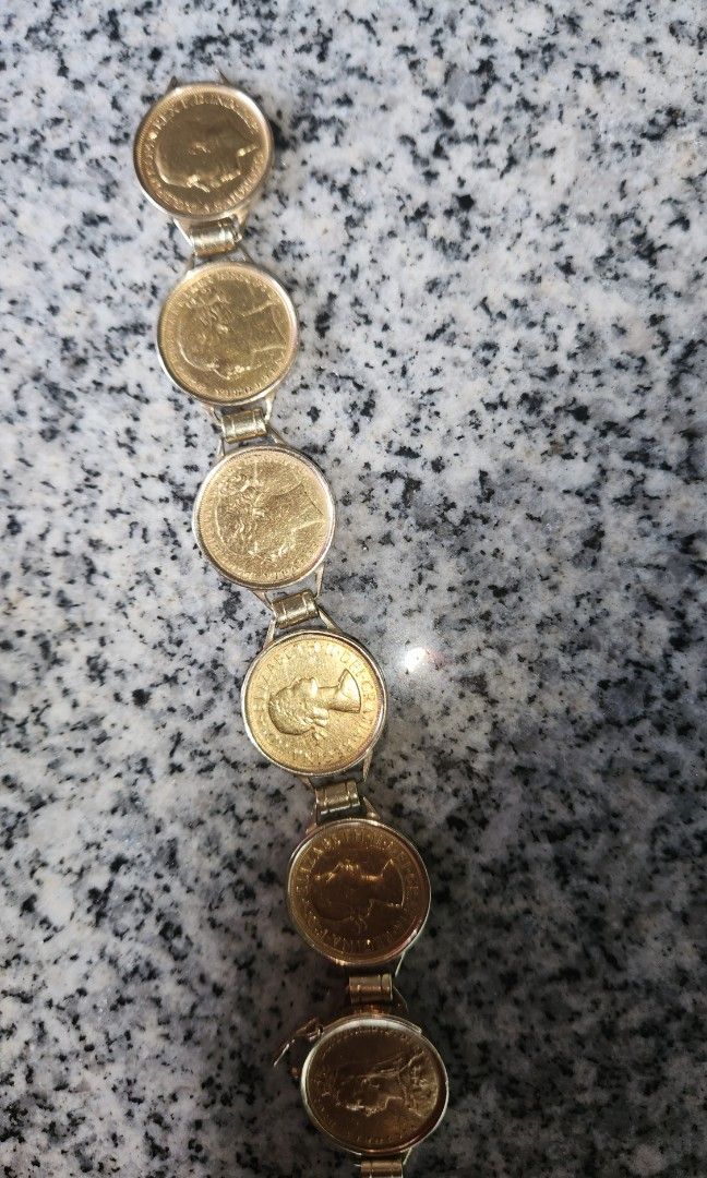 Old coin bracelet top