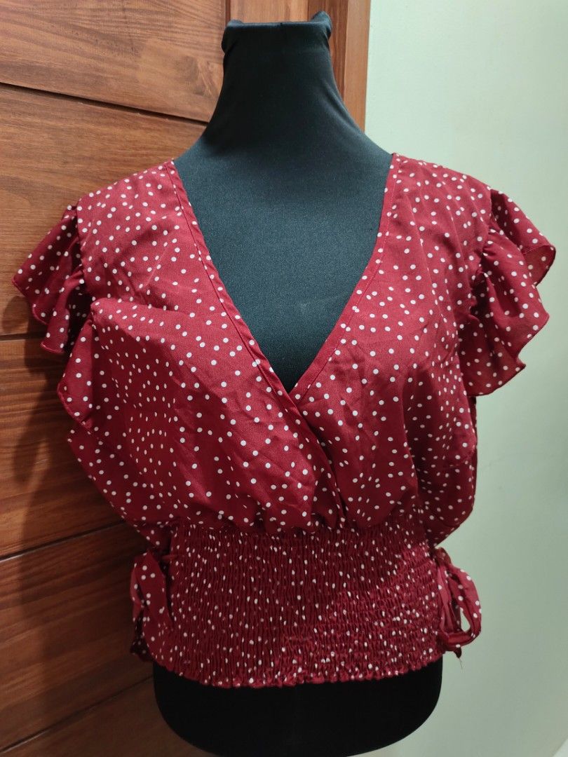 Red polka formal top with side tie (Category: Blouses) located in Paranaque City. Submitted by expectmore.payless (Listing ID 1331467452, Image 2). Description: brandnew never nagamit - ang ganda nito perfect pang xmas or new year outfit kaso di kasya sakin :( fits 2XL and up.
