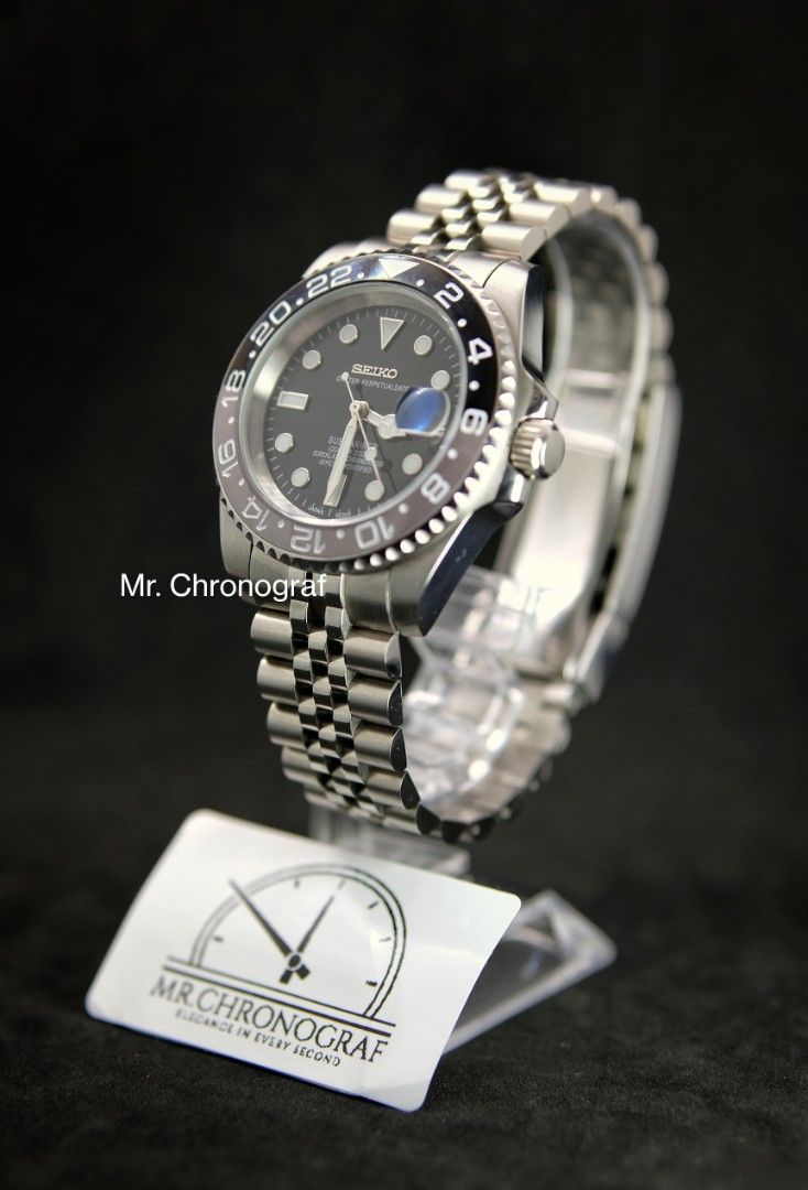 Seiko Mod Submariner Bruce Wayne (Category: Luxury Watches) located in Manila. Submitted by rafael_lesaguis (Listing ID 1331476259, Image 2). Description: Seiko Mod Submariner Bruce Wayne Movement: Seiko NH35 Automatic TMI version with winding and hacking feature Case and Strap: 40mm 904L Stainless Steel version (better than 316) & 904L Oyster Type strap Dial: Seiko logo, 1000ft Submariner Glass: Sapphire scratch resistant with cyclops Hands: Sil