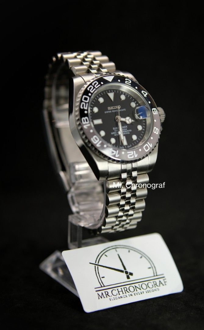 Seiko Mod Submariner Bruce Wayne (Category: Luxury Watches) located in Manila. Submitted by rafael_lesaguis (Listing ID 1331476259, Image 3). Description: Seiko Mod Submariner Bruce Wayne Movement: Seiko NH35 Automatic TMI version with winding and hacking feature Case and Strap: 40mm 904L Stainless Steel version (better than 316) & 904L Oyster Type strap Dial: Seiko logo, 1000ft Submariner Glass: Sapphire scratch resistant with cyclops Hands: Sil