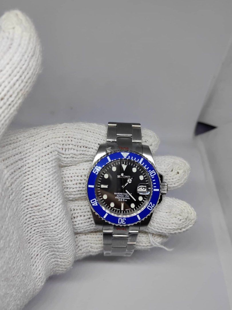 Seikolex blue bezel (Category: Men's Watches) located in Manila. Submitted by moneyunlimited (Listing ID 1331524044, Image 2). Description: Seikolex Blue bezel black dial Mod ALL BRAND NEW. - 904L Stainless Submariner Case - NH35A Movement w/ Winding & Hacking Mechanism - 40mm Case Diameter - 20mm Lug Width - Oyster Bracelet - Sapphire Crystal Glass - Date Magnifier - Mercedes Hands - Ceramic Bezel Disclaimer: Not affiliated with the brands shown