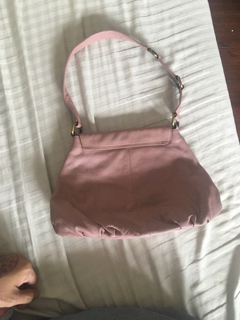 Vintage oriano shoulder bag (Category: Shoulder Bags) located in Pasig City. Submitted by viktonline (Listing ID 1331416105, Image 2). Description: Uses twice only, no flaws The exterior leather just needs cleaning while the interiors are silky flawless W- 12” L- 10” A- 3”.