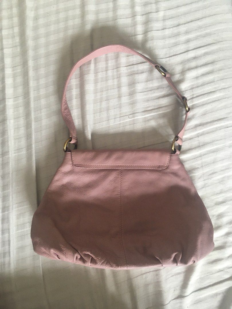 Vintage oriano shoulder bag (Category: Shoulder Bags) located in Pasig City. Submitted by viktonline (Listing ID 1331416105, Image 3). Description: Uses twice only, no flaws The exterior leather just needs cleaning while the interiors are silky flawless W- 12” L- 10” A- 3”.