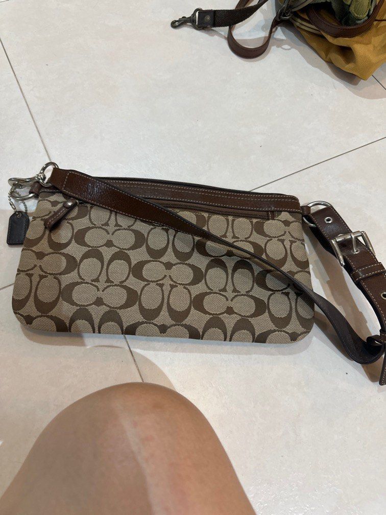 Coach Wristlet (Category: Bags & Wallets) located in Singapore. Submitted by connie.ouyang.98 (Listing ID 1331687468, Image 2). Description: Moving house clearance .