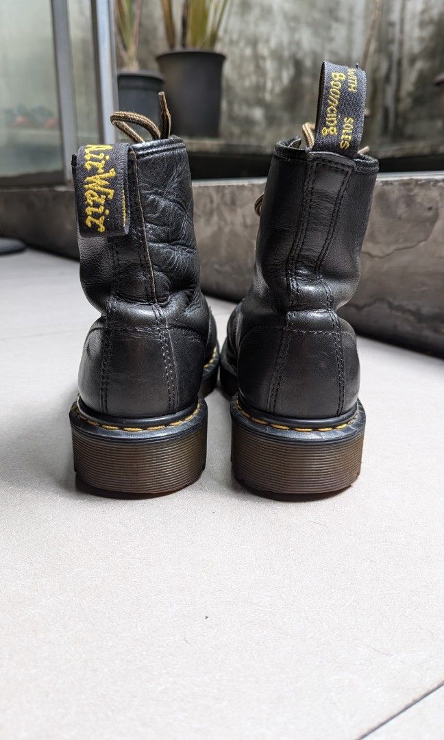 Dr. Martens original - Made in England (Category: Boots) located in Pasig City. Submitted by tessiegc (Listing ID 1331604910, Image 3). Description: 8 holes-high, classic Doc Martens. Made originally in England. All original. Size 8 for Men. I am female and this is the only size that fits my foot length. Sadly too heavy for me. This has been cared for with leather conditioner even when stored. Please be mindful of the small cracks on the trim. ot